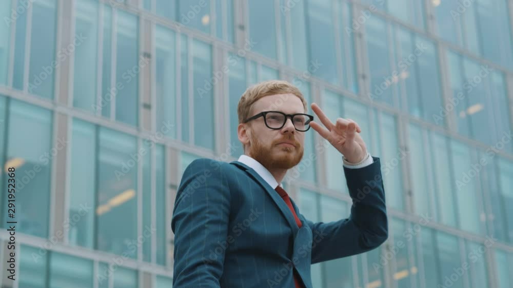 Portrait of funny dancing entrepreneur