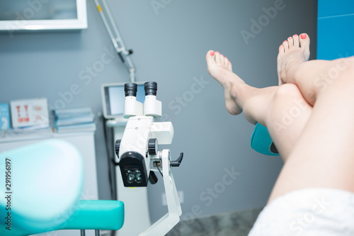 Valokuva a microscope in the gynecologist’s office to examine patients on a gynecological