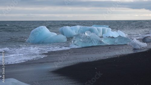 blue ice in grey sea