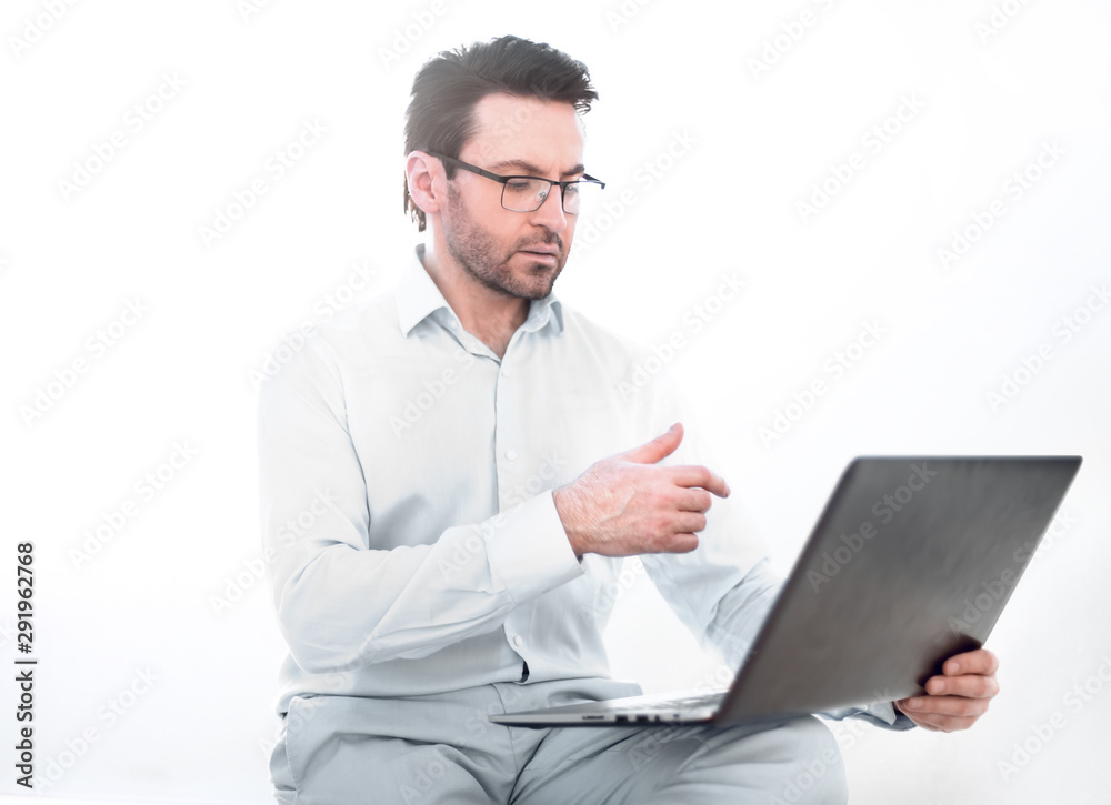 close up.serious businessman typing text on laptop close up.serious businessman typing text on laptop
