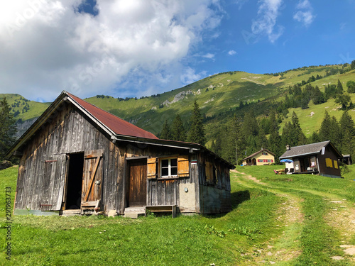 The Alpine village of Vorder Ahornenin in a Oberseetal mountain valley and in the Glarnerland tourist region, Nafels (Näfels or Naefels) - Canton of Glarus, Switzerland photo