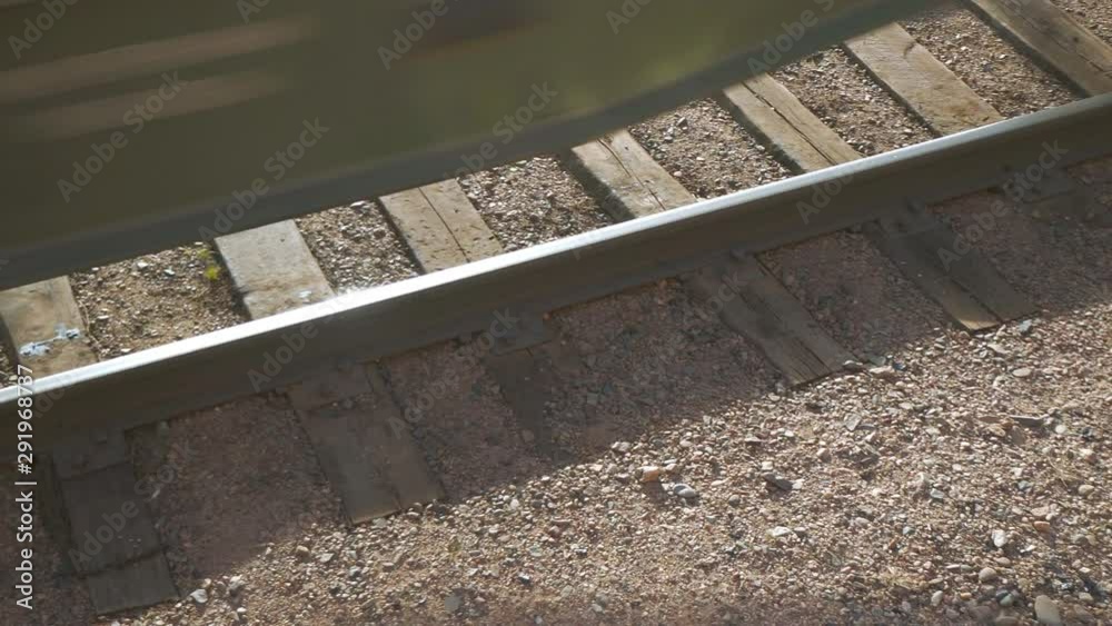 Close-up: High angle view of moving train on railroad track - Ulaanbaatar, Mongolia Close-up: High angle view of moving train on railroad track - Ulaanbaatar, Mongolia