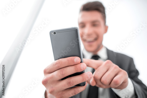 businessman reading a text message