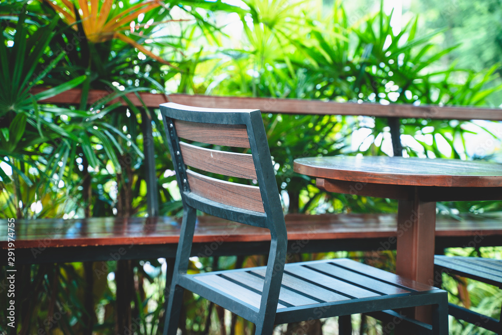 Outdoor patio chair and table. Outdoor wooden patio chair and table Outdoor patio chair and table. Outdoor wooden patio chair and table