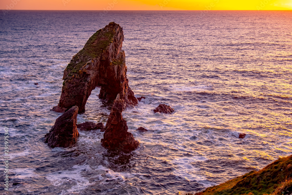 Crohy Head Sea Arch Breeches during sunset - County Donegal, Ireland Crohy Head Sea Arch Breeches during sunset - County Donegal, Ireland