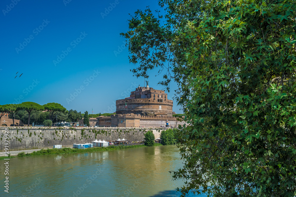 Sant'Angelo Castle framed by the tree in Rome, Italy