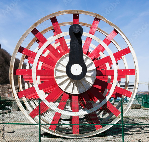 Canvas Print Close up of red riverboat paddle wheel.