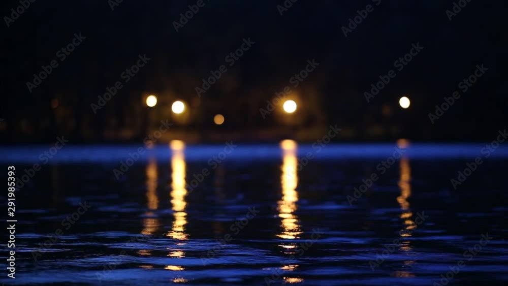 evening water and reflection of lights in the lake evening water and reflection of lights in the lake