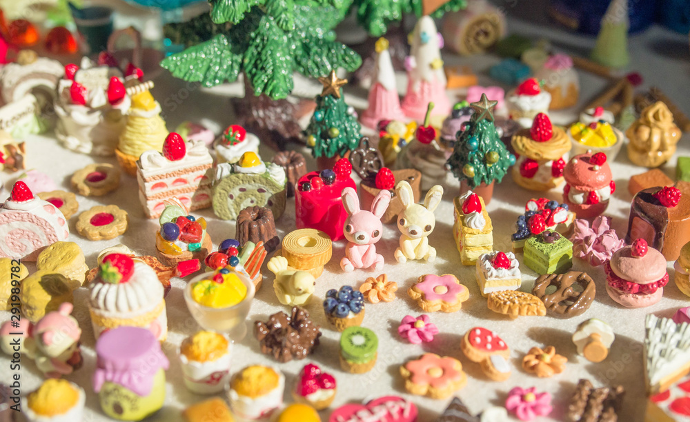 Obraz premium Merry Chrismas with a lot of miniature toys. Sweet party, dessert table toy concept.