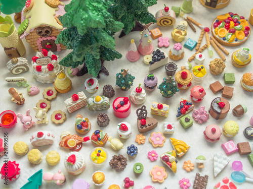 Merry Chrismas with a lot of miniature toys. Sweet party, dessert table toy concept.