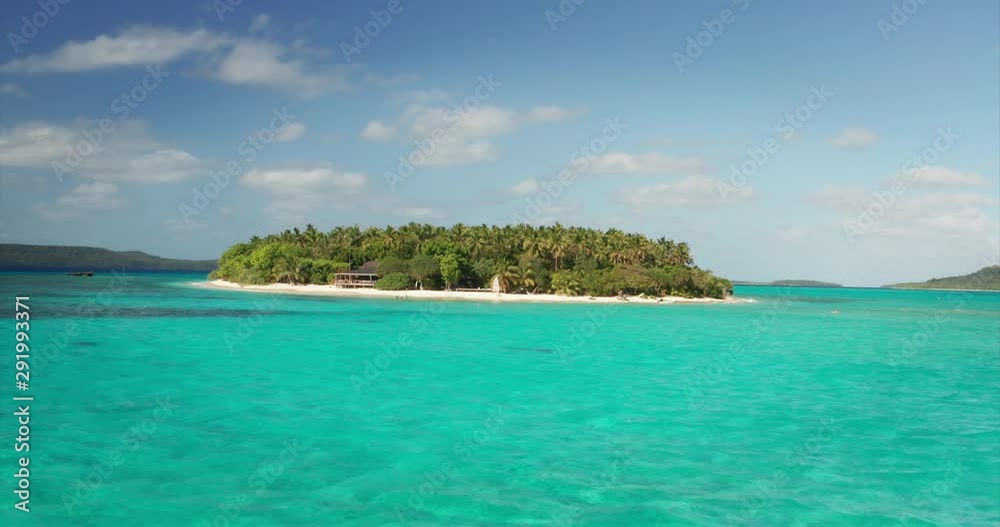 Aerial view of scenic landscape of desert island with white sand beach, crystal clear sea water and palm trees. Aerial view of scenic landscape of desert island with white sand beach, crystal clear sea water and palm trees.