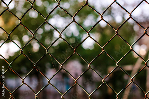 Chain link fenceclose up with bokeh background