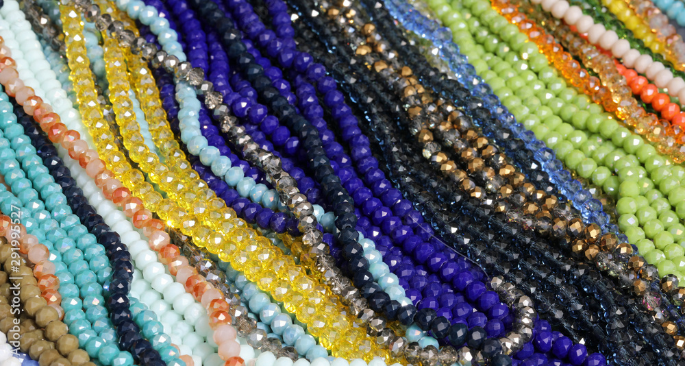 many colorful pearl necklaces in a jewelry store