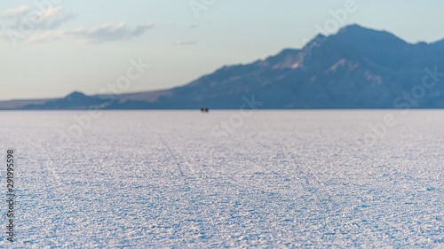 Bonneville Salt Flats panorama of landscape near Salt Lake City, Utah and mountain view during sunset and sand texture photo