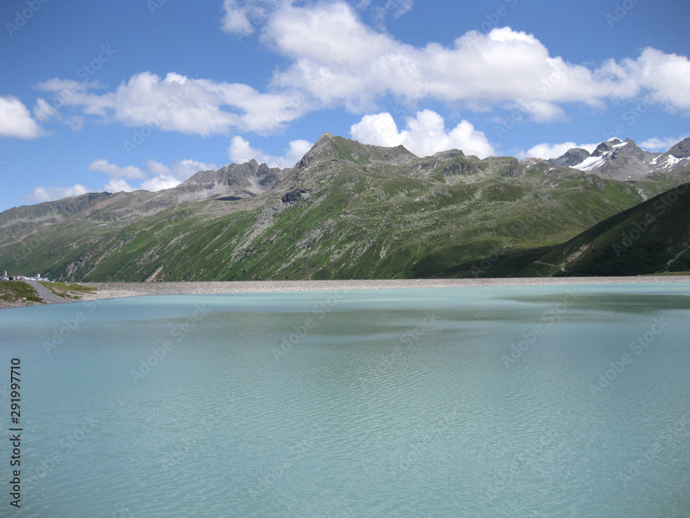 Blue mountain lake in the alps in summer