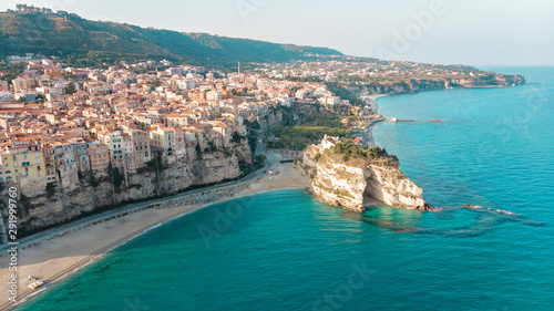 Drone view of the Italian town of Tropea in Calabria. Aerial View of the coastline, city and the Santa Maria dell Isola Monastery © dpVUE .images