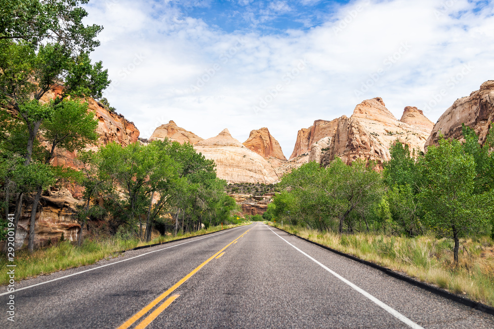 Red rock formations landscape view from road trip in summer in Capitol Reef National Monument in Utah Red rock formations landscape view from road trip in summer in Capitol Reef National Monument in Utah