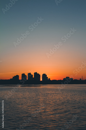 sunset over city © антон филиппов