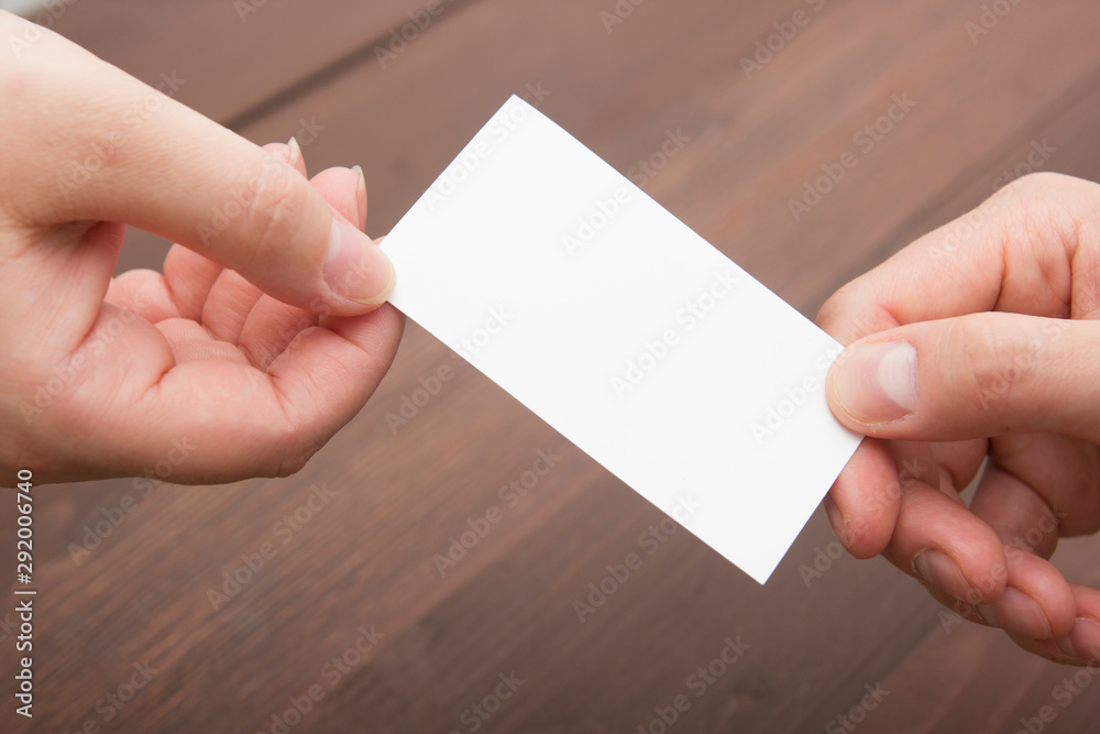 Obraz premium business executive exchanging business card blank. Copy space