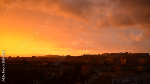 Silhouette City Sunset with clouds in Murmansk Russia with dramatic red  blue and ornage sky