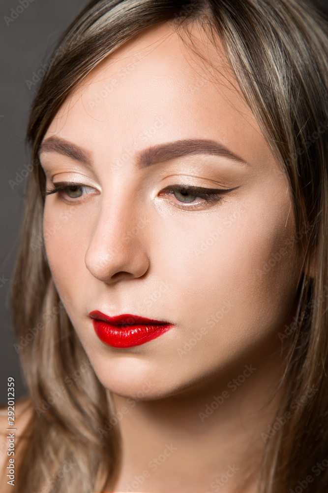Sexy beauty face. Glamour portrait of beautiful woman model with day makeup. Fashion shiny highlighter on skin, sexy red lips make-up and perfect eyebrows. beauty portrait - Image Sexy beauty face. Glamour portrait of beautiful woman model with day makeup. Fashion shiny highlighter on skin, sexy red lips make-up and perfect eyebrows. beauty portrait - Image