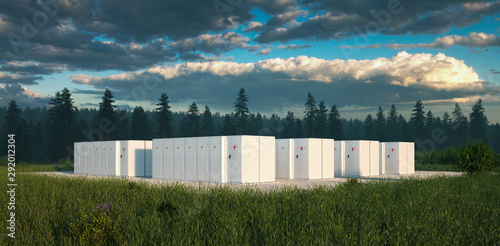 Eco friendly battery energy storage system in nature with misty forest in background and fresh grassland in foreground. 3d rendering. photo