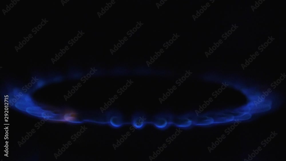 Slow motion - Close up of gas ring hob cooker, isolated black background in kitchen. Cooking Dinner Slow motion - Close up of gas ring hob cooker, isolated black background in kitchen. Cooking Dinner