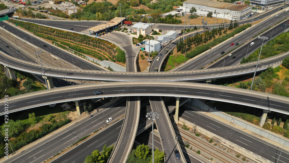 Aerial photo of multilevel junction highway overpass in urban area with beautiful sky and clouds Aerial photo of multilevel junction highway overpass in urban area with beautiful sky and clouds