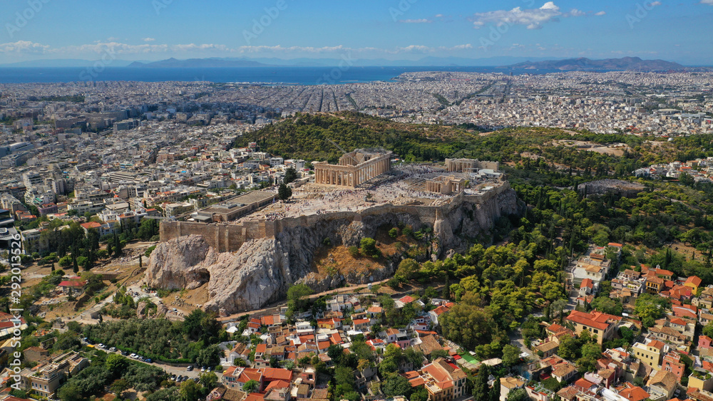 Aerial drone panoramic photo of iconic Acropolis hill featuring masterpiece of Ancient times the Parthenon, Athens historic centre, Attica, Greece