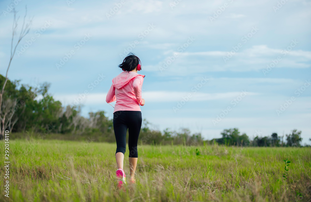 Women jogging in the beautiful nature Women jogging in the beautiful nature