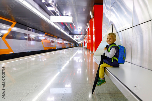 Wallpaper Mural portrait of a little citizen who is waiting for a metro train at the new Moscow metro station. Torontodigital.ca