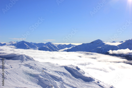 a sunny day in the mountains and fog in the valley © Luciernaga