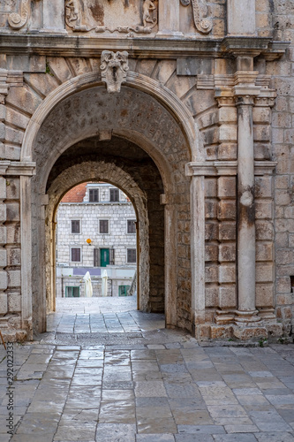 View on stone facades and arches in historic fortified Korcula town, Korcula Island, Dalmatia, Croatia