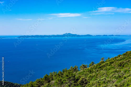 View on Lastovo Island, green nature, blue sky and clear Adriatic sea water, summer holidays, Dalmatia, Croatia © Mislav