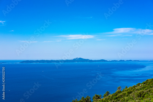 View on Lastovo Island, green nature, blue sky and clear Adriatic sea water, summer holidays, Dalmatia, Croatia © Mislav