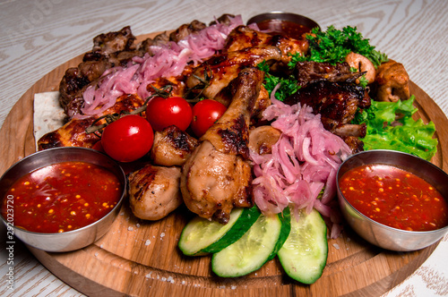 meat plate with vegetables and herbs