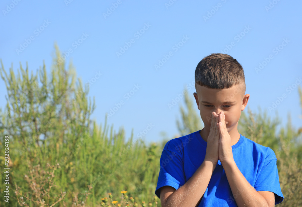 Little boy suffering from ragweed allergy outdoors Little boy suffering from ragweed allergy outdoors