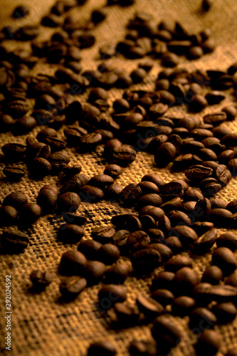 moody photograph of Roasted Coffee Beans on hessian