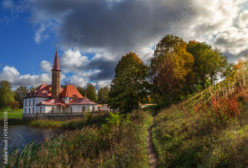 Idyllic autumn landscape with castle in old town of Gatchina. Russia. 