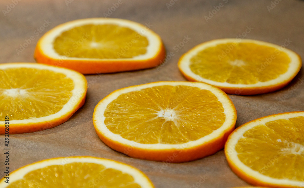 sliced rings of fresh juicy orange for drying