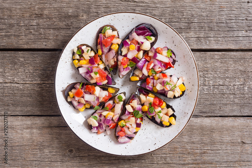 Traditional  Peruvian food background with mussels photo