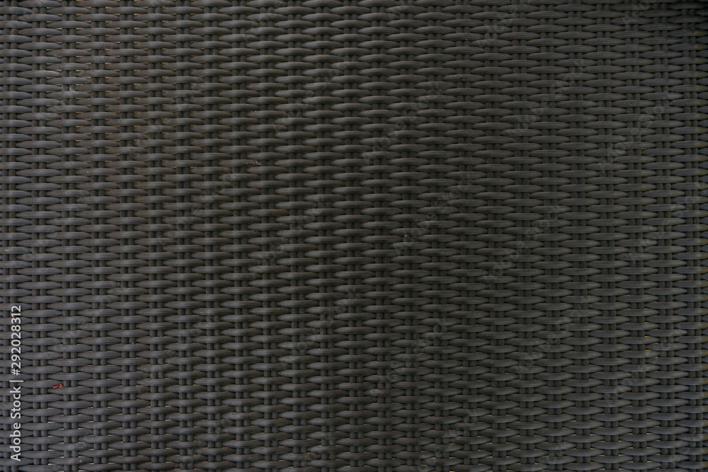 Gray brown synthetic rattan texture weaving background Gray brown synthetic rattan texture weaving background