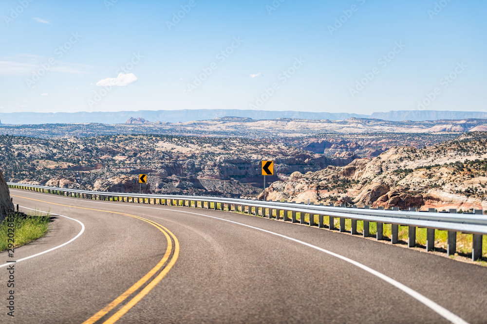 Beautiful winding highway 12 scenic road in Grand Staircase Escalante National Monument in Utah summer with curve signs and views
