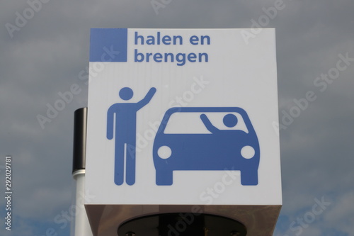 White and blue sign for bringing and picking up at the railway station Lansingerland Zoetermeer in the Netherlands photo