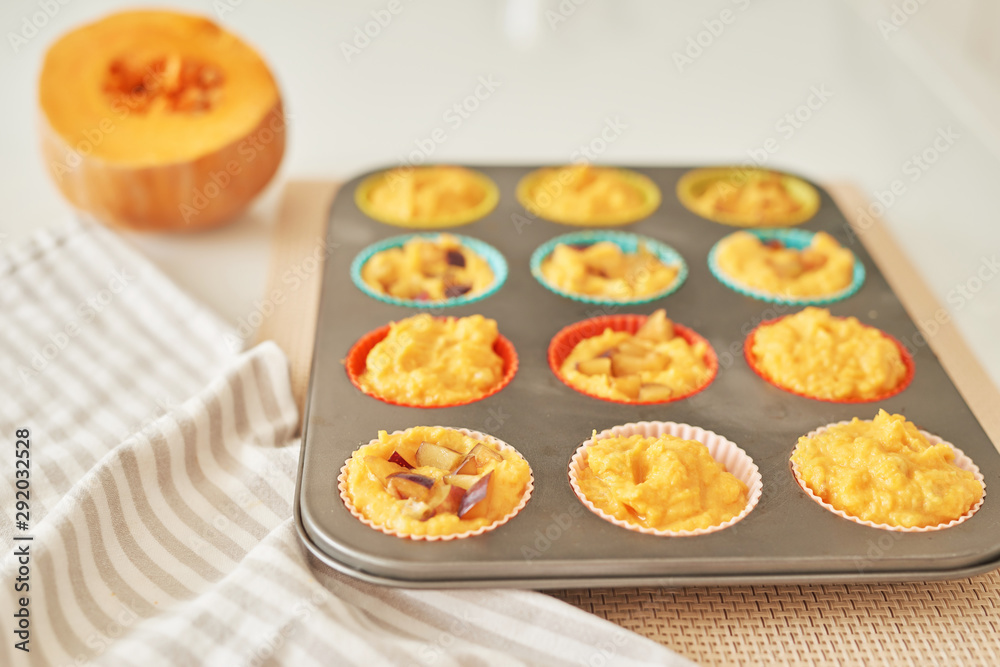 Thanksgiving, pumpkin muffins for Halloween, cooking at home in the kitchen Thanksgiving, pumpkin muffins for Halloween, cooking at home in the kitchen