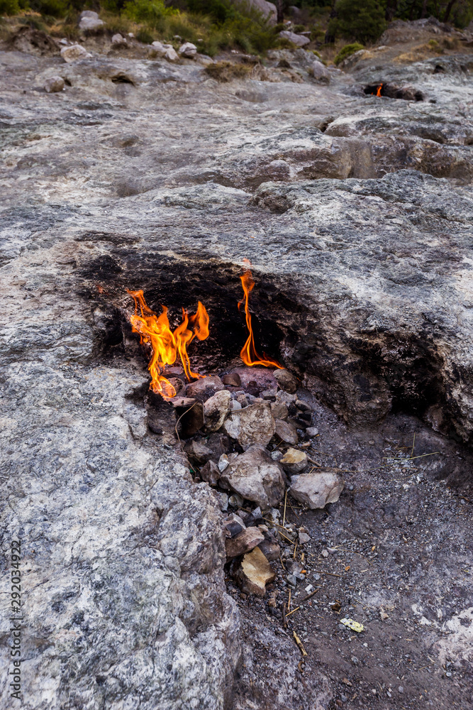 Yanartas burning stones is a geographical feature near the Olympos valley and national park in Antalya Province in southwestern Turkey Yanartas burning stones is a geographical feature near the Olympos valley and national park in Antalya Province in southwestern Turkey