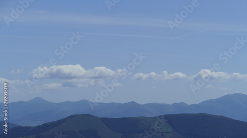 Mountains with blue sky and clouds