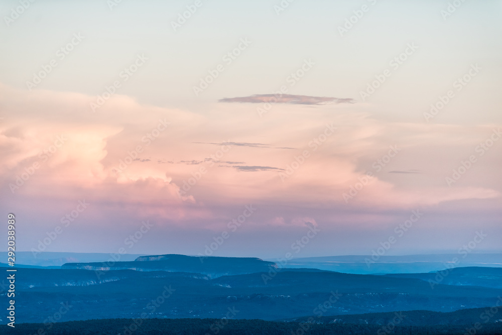 Paria view overlook with beautiful twilight purple dark blue pink sky with clouds and horizon in Bryce Canyon National Park after sunset