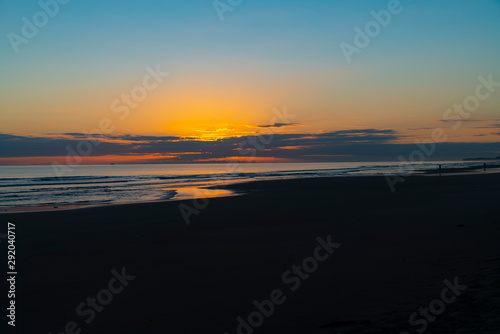Oceanbeach as sun is on horizon