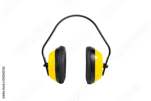 Yellow ear-muffs isolated on a white background. Earplugs. The concept of hygiene and safety at work, home. Too loud sound, hearing damage.